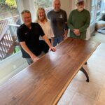 customer with custom wood dining room table
